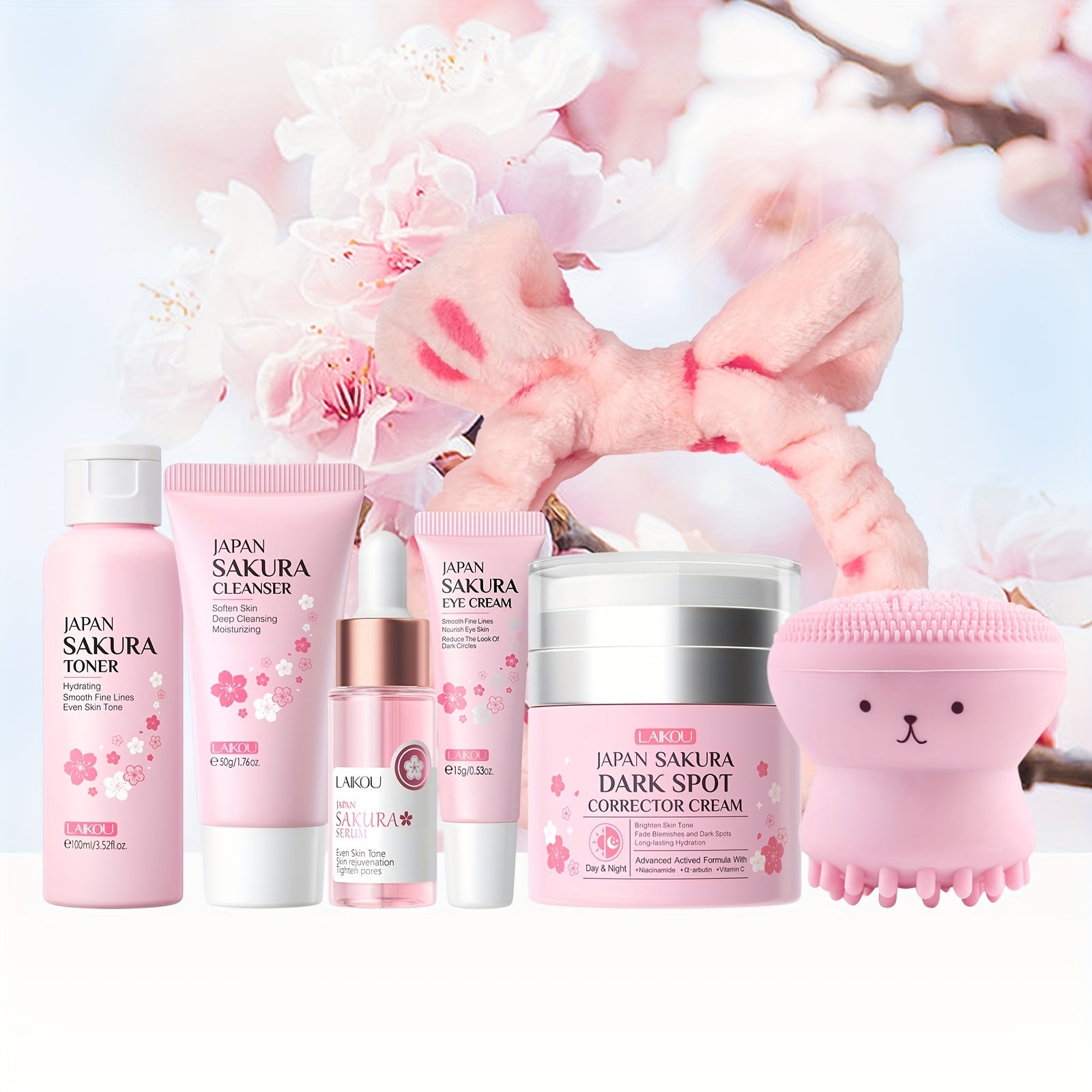 LAIKOU Sakura Facial Skincare Kit for Women - Hypoallergenic 7-Piece Set with Cleanser, Toner, Serum, Eye Cream, Spot Corrector Cream, Silicone Brush, Hairband - Vitamin C, Hyaluronic Acid - Moisturizing, Brightening, Anti-Ag